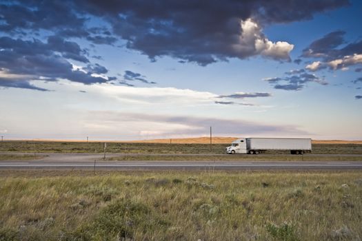 Sunset Ride - blurred Semi-truck