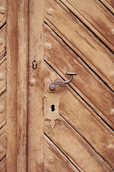 Detail of the closed and locked old door