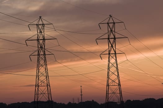 Power lines and Cell Tower at sunset