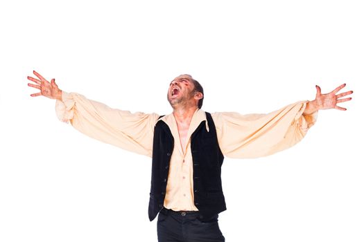 Male vampire roaring with arms raised, looking up on white background