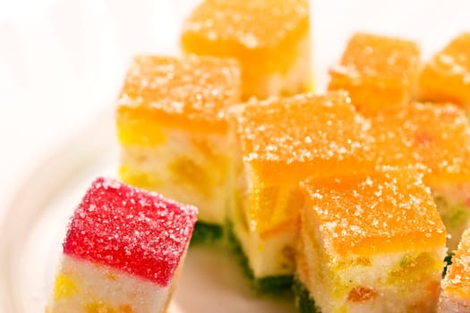 Macro picture of Slices fruit jelly with sugar