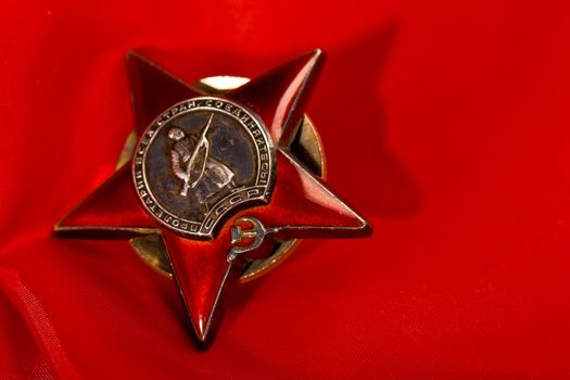 honour series: star medal over red background