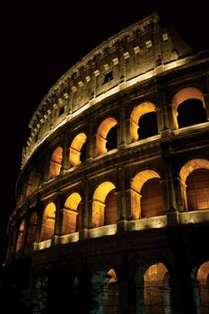 The Colosseum in Rome Italy at night.
