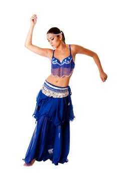 Beautiful Arabic belly dancer harem woman in blue with silver dress and head jewelry with gem dancing twirling her arms, isolated.