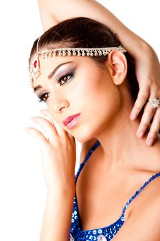 Face with hands of a beautiful Middle Eastern Egyptian Israeli Lebanese Turkish Arabic woman with makeup in the Belly Dancer style, isolated.