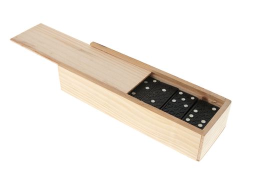 Domino in wooden box isolated on white background.