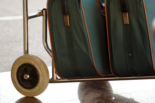 suitcases on a cart