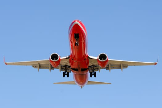 Red plane is going to land 