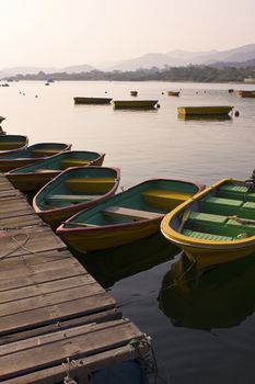 Boats on the lake and the beautiful sunset