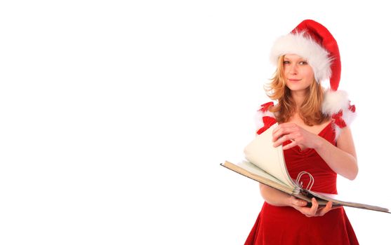miss santa is holding a ring binder and page turning - bookkepping and paper work - whitespace on the left