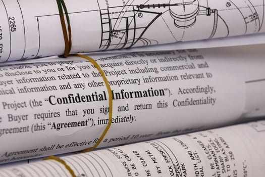 Confidential information on blueprints - shallow dof focus on confidential information.