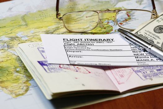 Plane e-ticket itinerary with map and eyeglass