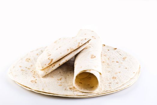 Stack of tortillas with two on the top - isolated