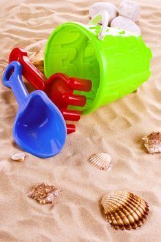 Children's toys -  bucket, spade and shovel on sand
