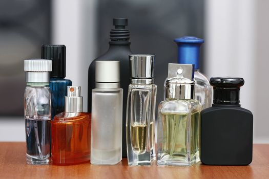 Perfume and fragrances bottles blurry background sharp resolution subject.