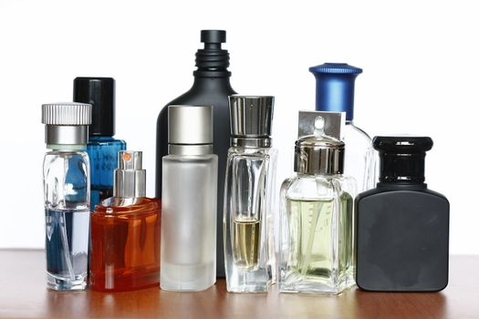 Perfumes and fraggrances  bottles in a white background.