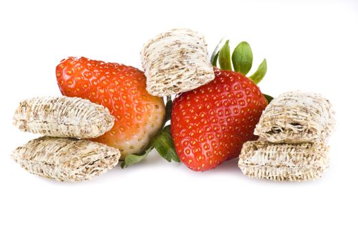 Wheat cereal with strawberries over white background - isolated