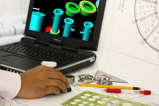 3D model review of nozzle flanges - many uses for the oil and gas industry. 3D model in the monitor is my original works.