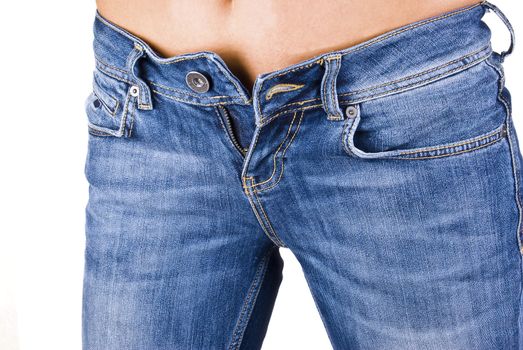 women wearing a pair of blue jeans against white background