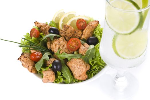 Chicken and vegetable salad with ice cold drink isolated over white background