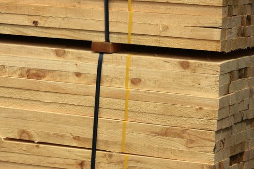 Photo of a background texture of wood use in construction
