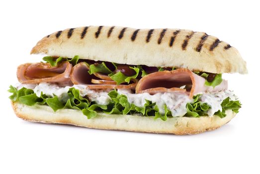 Ham and vegetable sandwich over white background