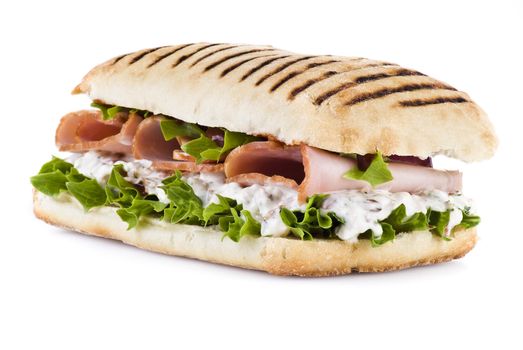 Ham and vegetable sandwich over white background