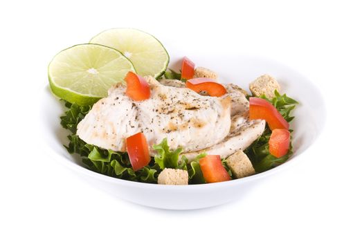 Fresh chicken and vegetable salad - isolated over white background