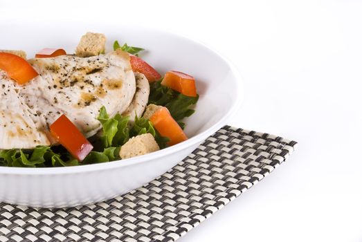 Fresh chicken and vegetable salad - isolated over white background