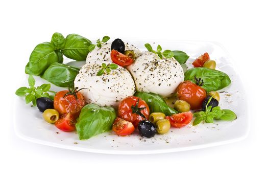 Mozzarella with fresh basil and  cherry tomatoes over extra virgin oil