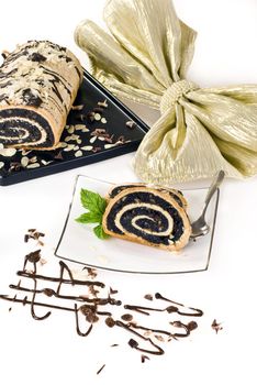 Poppy seed cake on decorated table