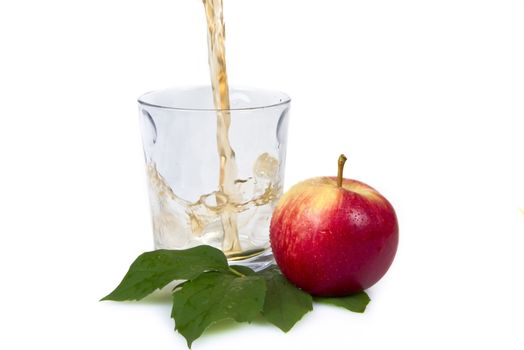 Pouring apple juice - isloated over white