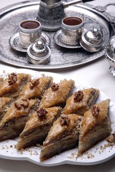 Village 80 layer Baklava and coffee on a table
