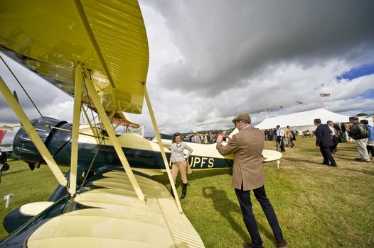 75 Years of the Spitfire celebrated at Goodwood.  Goodwood celebrates its aviation heritage each year at the Revival with some stunning aerial manoeuvres throughout the skies above this former WWII aerodrome.  During the 1940s, RAF Westhampnett (as it was known then ) was one of the RAF?s most active airfields, a satellite station to Tangmere and a Battle of Britain site.