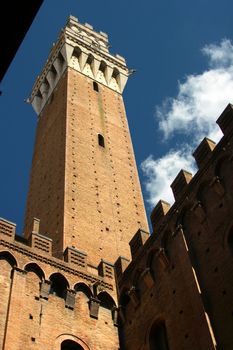 TOWER, Siena, Palio di Siena, landscape, Toscana, Italy, sky, clouds, tourism, vacation, destination, ecotourism, europe, european, italian, Flags, festival, historical re-enactment, medieval costumes, leisure, lifestyle, location, recreation, place, summer, tourism, tourist, travel, vacation, voyage, trees, monuments, holiday, attraction, culture, famous, historic, landmark, people, square, travelers, traveler, traveling, vacation,  Architecture, medieval buildings,