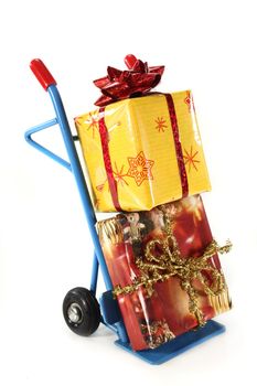 colorful Christmas presents on a hand truck