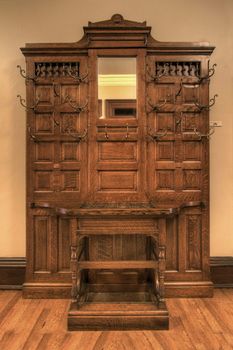 Antique Oak Hat and Coat Hanger Hooks in Historic Building