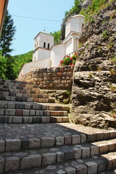 old orthodox Gornjak Monstery in Serbia, stone stairs and church exterior