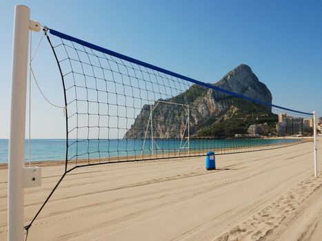 Volleyball net on a sandy mediterranean beach