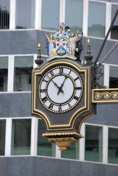 Clock outside office taken in city of london