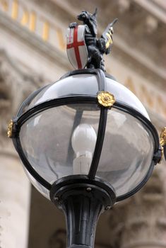 City street light in london with corporation crest
