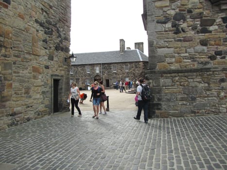 EDINBURGH, SCOTLAND - SEPTEMBER 4: Unidentified visitors at Edinburgh Castle September 4, 2010 in Edinburgh. The Pope visited Edinburgh Castle in September 2010.                 