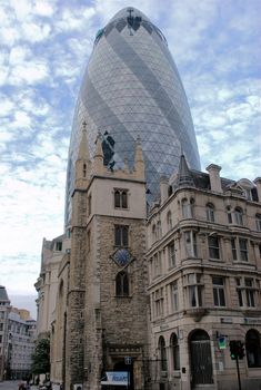 The london gherkin with st mary's axe near front