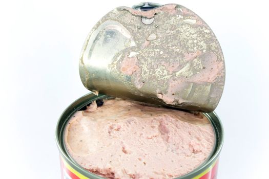 Opened can with meat