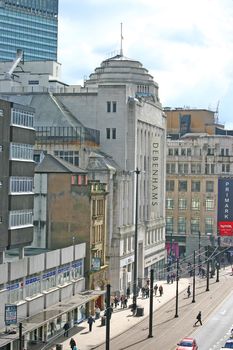 Shops and Tram Tracks in Manchester UK