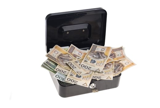 polish zlotys in black cash box isolated on white