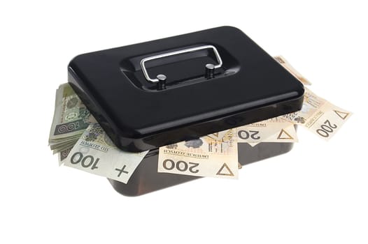 polish zlotys in black cash box isolated on white