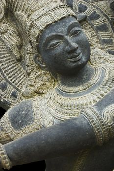 Stone Krishna Shiva statue. Object of cult in hindu culture.