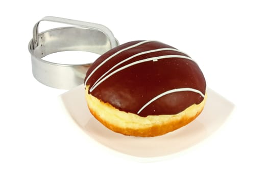 Donut topped with chocolate and mold cutting donuts