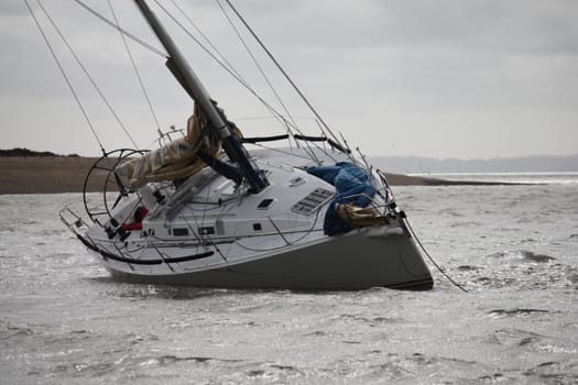 A yacht that has run aground